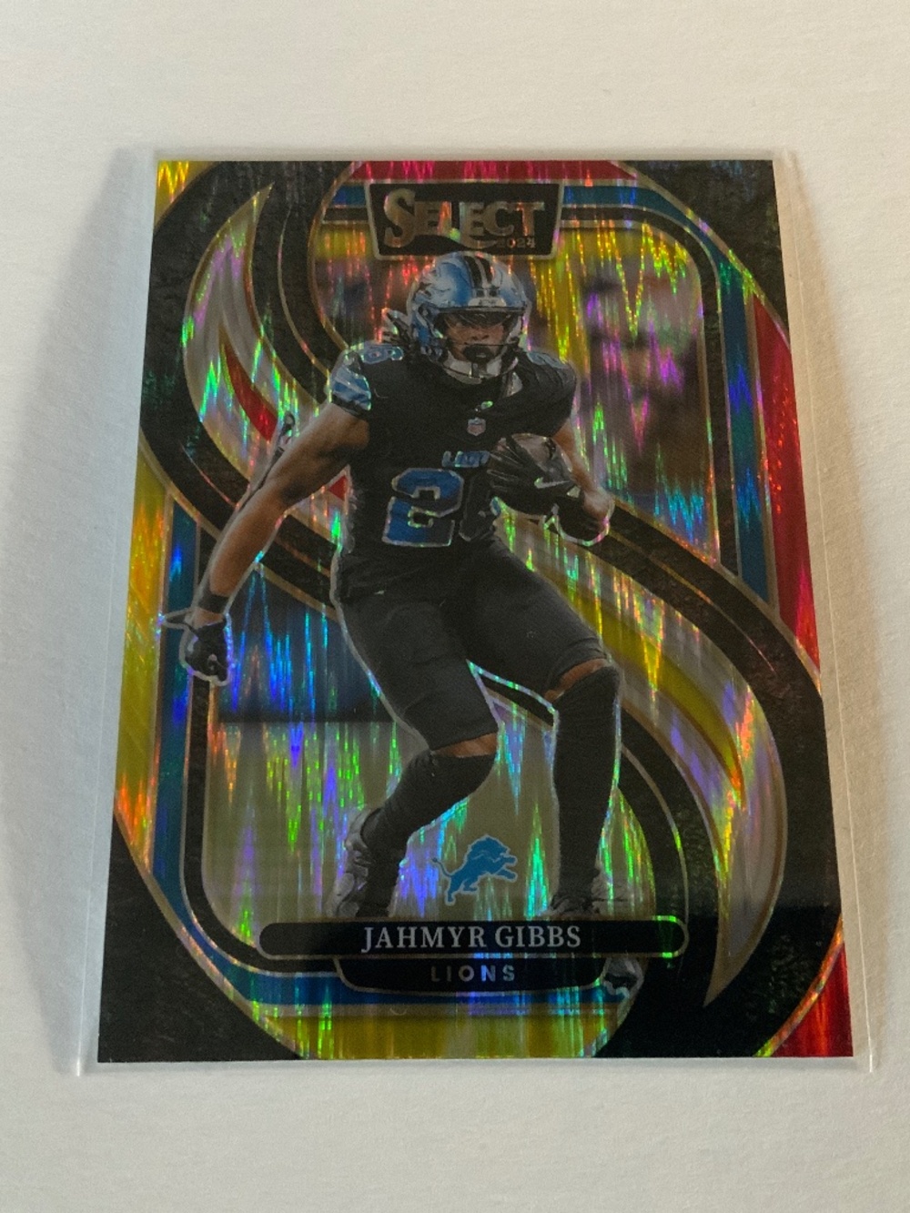 Jahmyr Gibbs 2024 Panini Select Red/Yellow Prizm Premier Level Football Card